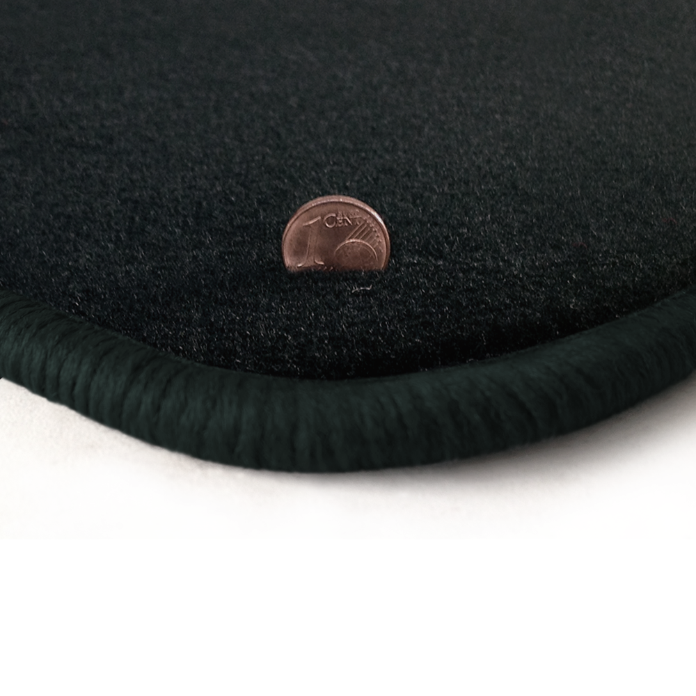 Eine Ecke als Beispiel einer Fussmatte Velours anthrazit mit Rand in anthrazit.